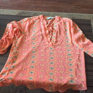 Karlie orange triangle blouse